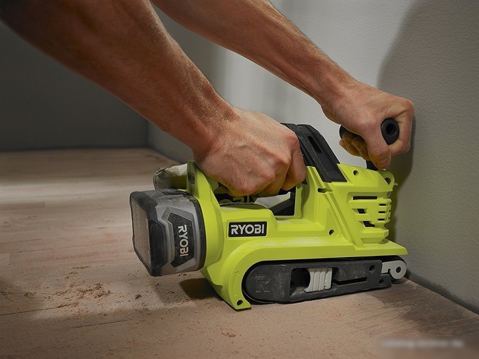 Ленточная шлифмашина Ryobi R18BS-0 [5133002916]