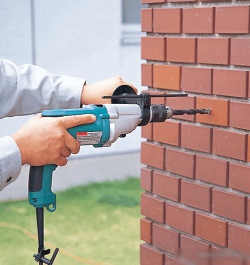 Ударная дрель Makita HP2051FJ (с кейсом MakPac)